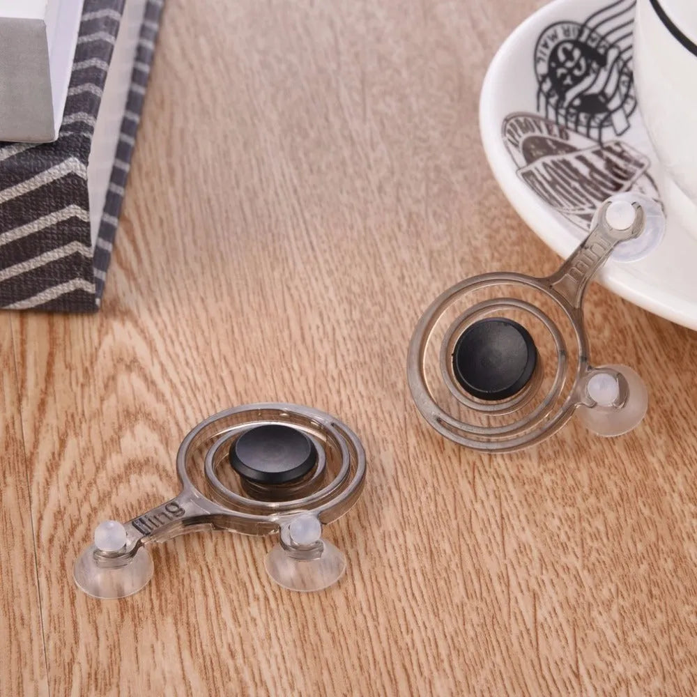 Two universal mini joystick grips for smartphone touchscreen gaming, shown with colour options.