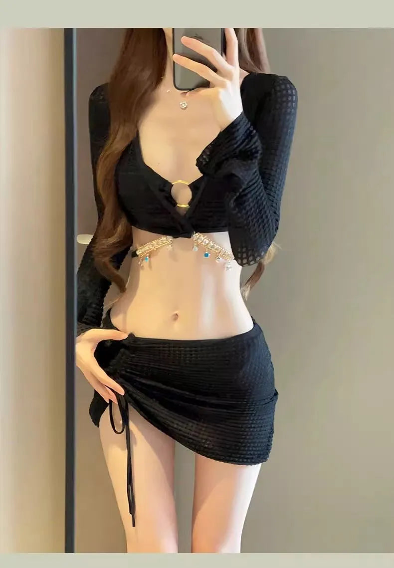 Women's long sleeve bikini swimsuit set in black or white polyester for swimming