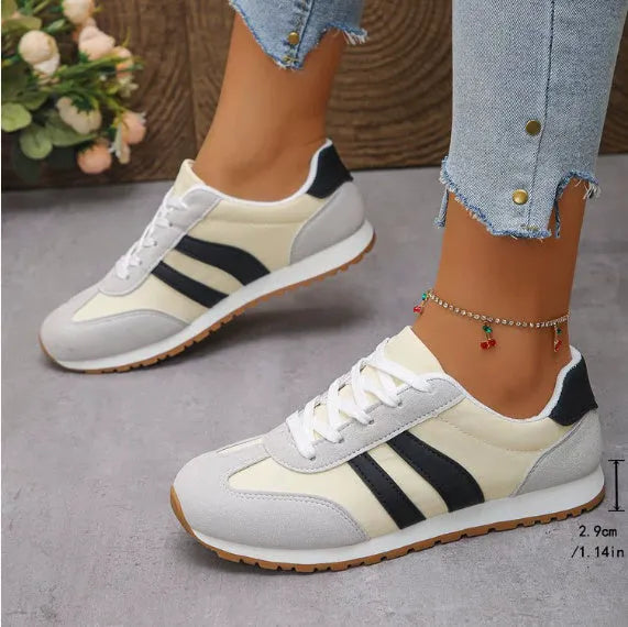 Blue and grey Cortez stripes casual sports shoes with round toe and flat rubber sole.