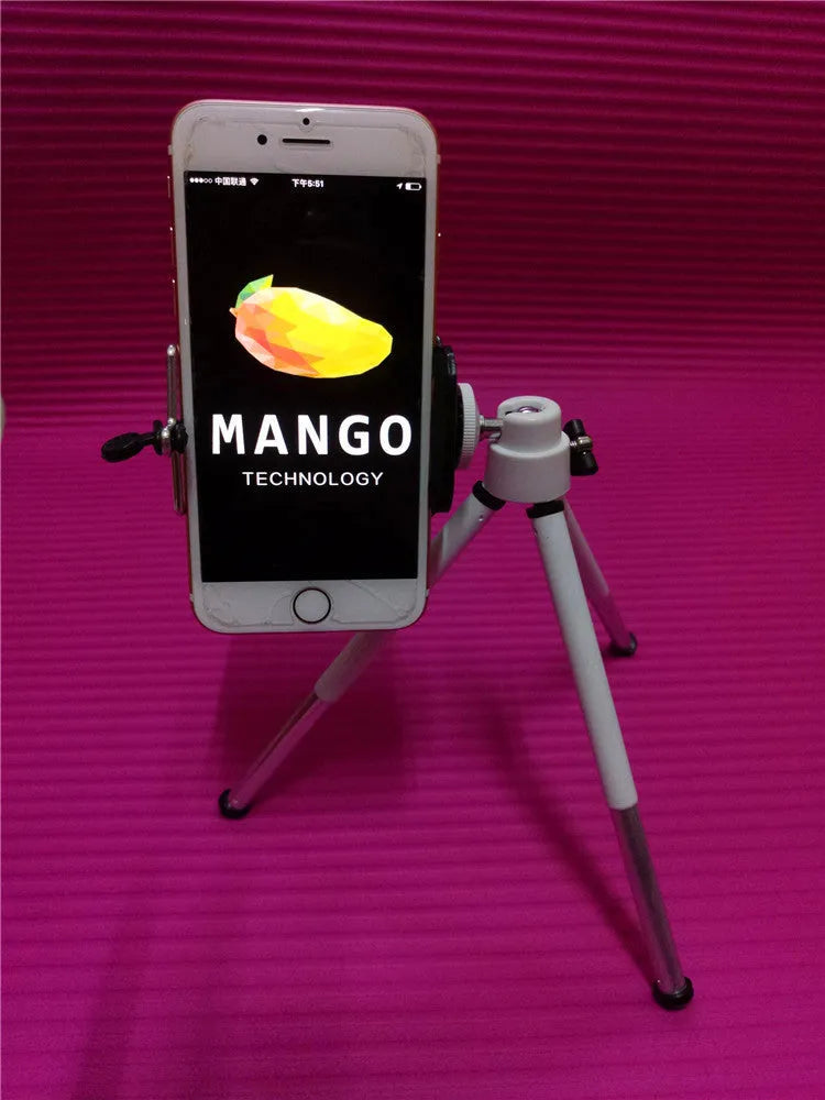 Black adjustable two-section bracket desktop phone holder on a wooden desk.