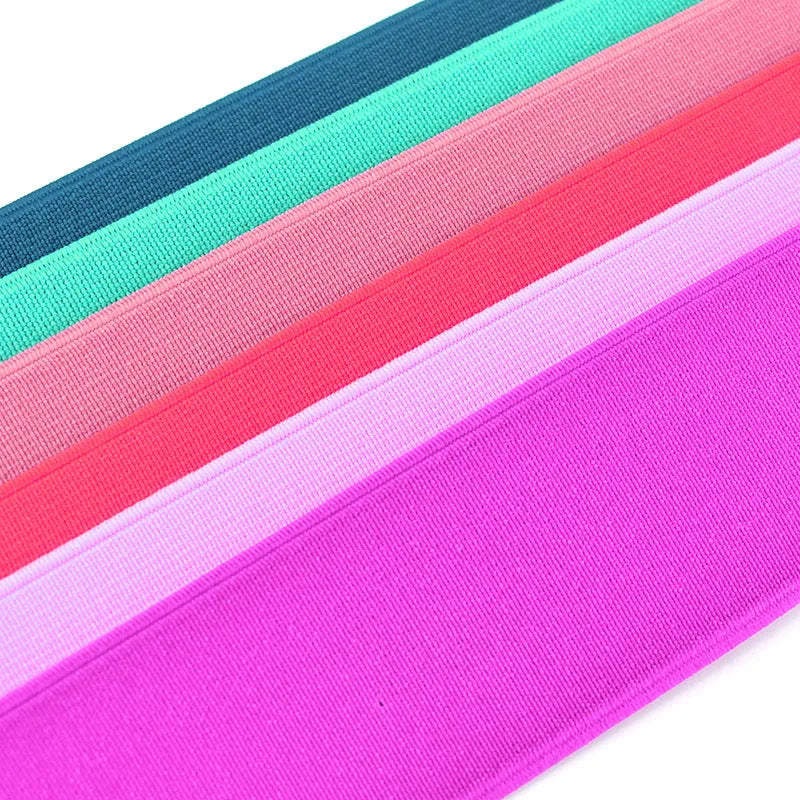 5cm wide colourful elastic band showing ten colour options including black, brown, dark red and blue variants