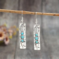 Silver geometric retro earrings with turquoise inlay on long strip zinc alloy design