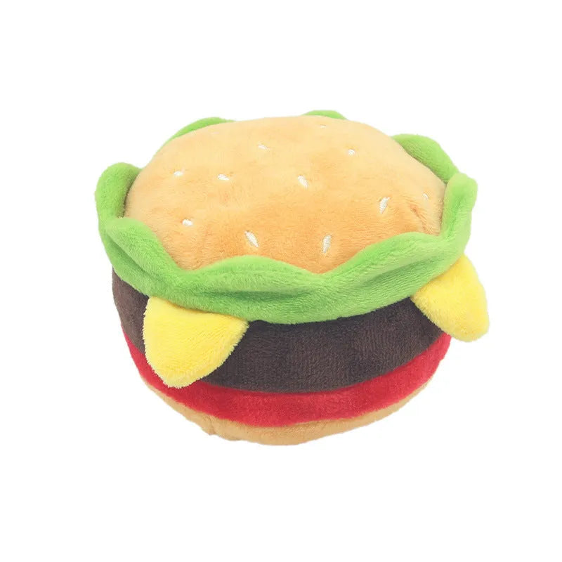 Plush dog toys shaped like hamburger, french fries and milkshake cup on white background