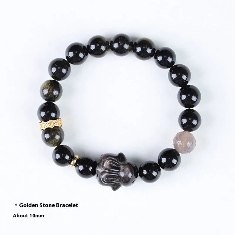 Handmade obsidian bracelet with lying rabbit charm, grey agate beads and brass metalwork in national style