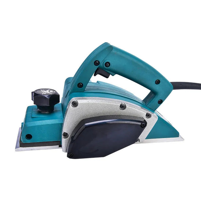 Red desktop electric wood planer with aluminium shell showing 82mm planing width