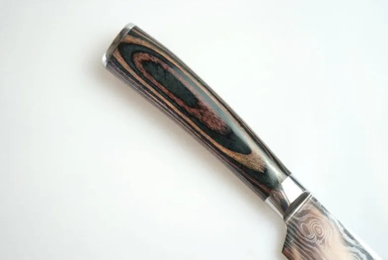 7Cr17 stainless steel kitchen knife with coloured wood handle and Damascus pattern blade on a black gift box.
