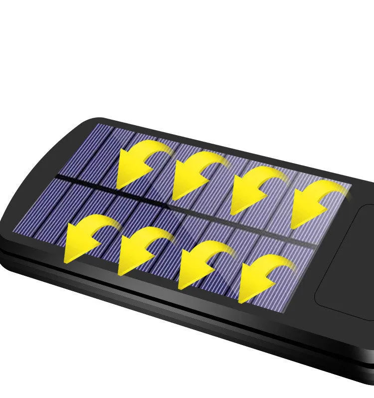 Black solar-powered outdoor wall light with motion sensor for gardens and pathways