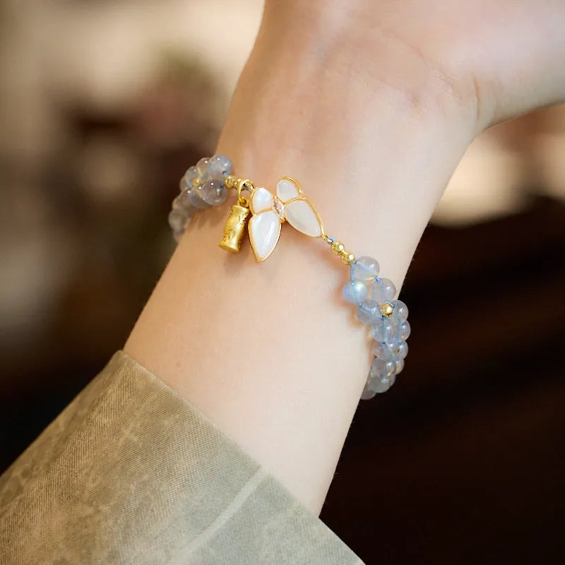 Gray moonstone bracelet with butterfly woven rope design and geometric retro styling