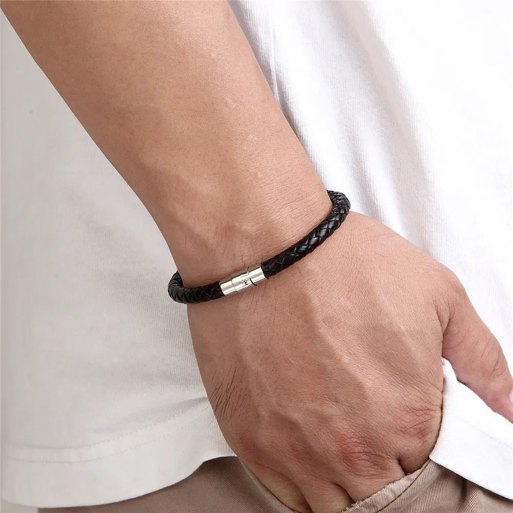 Men's titanium steel geometric bracelet with a magnetic clasp shown in one of four available colour finishes.