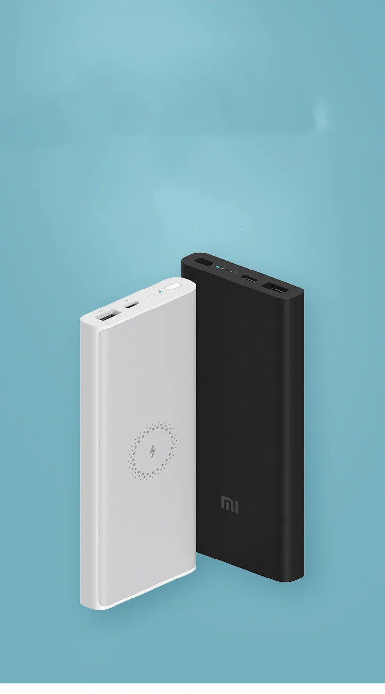 White 10000mAh power bank showing USB Type-C port, USB output, and wireless charging symbol.