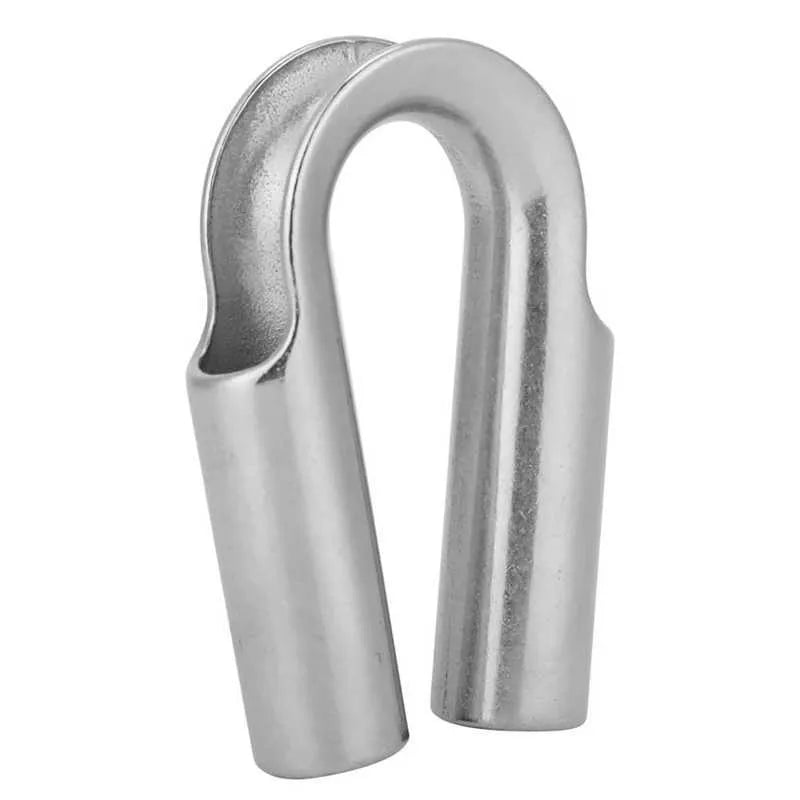 Stainless steel tubular chicken heart shaped sleeve ring set showing various metric sizes on a workbench.
