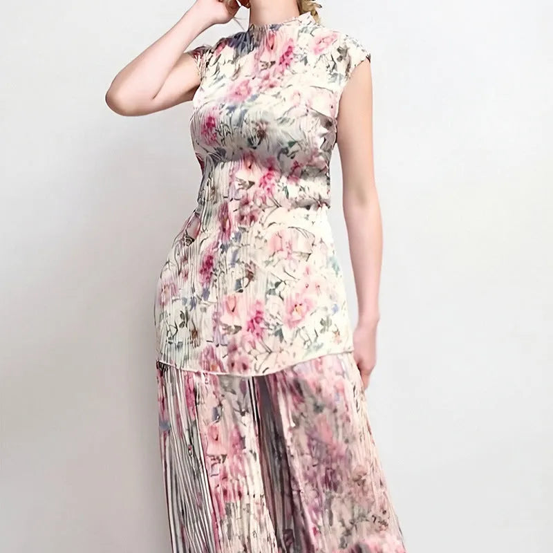 Women's printed chiffon dress set with high waist skirt and long sleeve top.