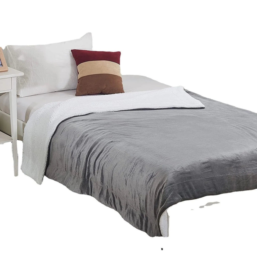 Grey and white USB electric heating blanket with intelligent temperature controls, laid flat.