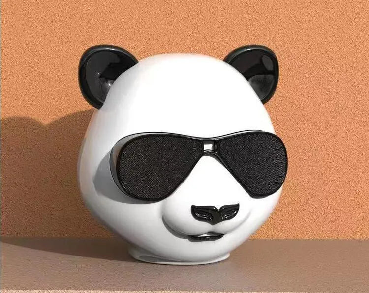 Portable mini Bluetooth speaker with classic style design showing wireless connectivity and USB charging port
