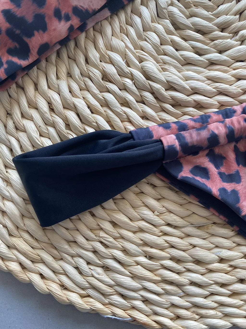 Women's leopard print and black bikini set with tube top and split-style briefs