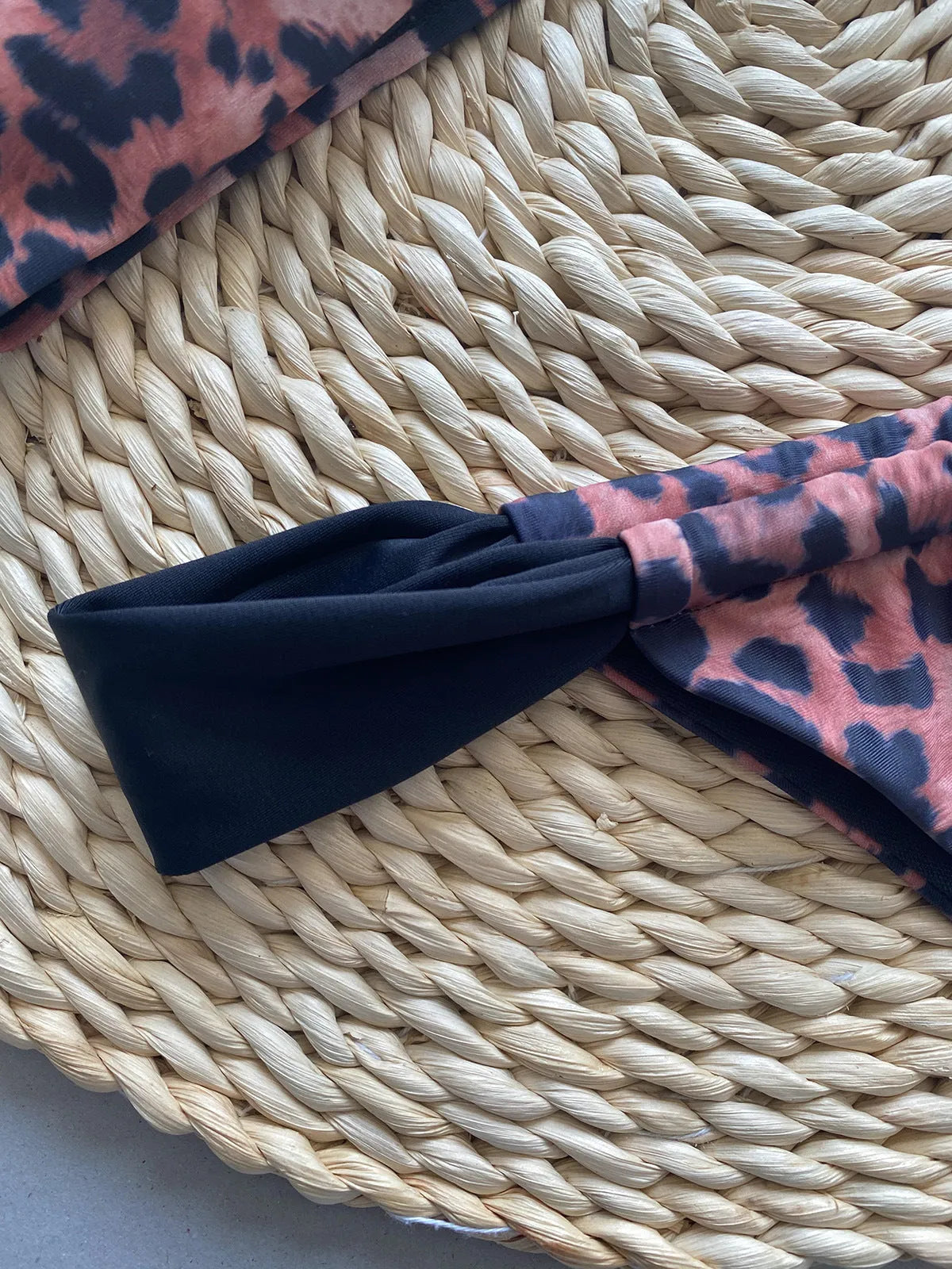 Women's leopard print and black bikini set with tube top and split-style briefs