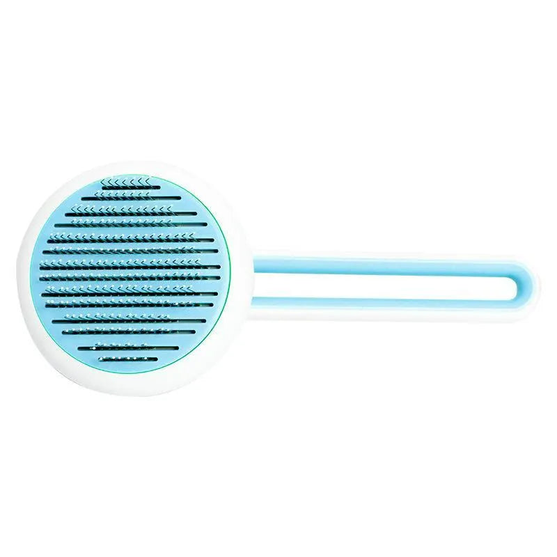Automatic pet grooming brush with stainless steel pins in blue, green, or pink, showing the handle grip and release button.