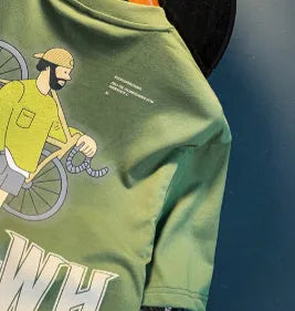 Green men's loose fit t-shirt with a literary design print on the front.