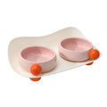 Ceramic raised pet feeding bowl set with two bowls and non-slip silicone supports in yellow colour