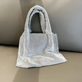 Silver shiny rhinestone evening handbag with open outer pocket for women's parties.