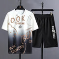 Men's light blue summer leisure suit consisting of a short sleeve T-shirt and matching shorts on a hanger