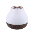 USB essential oil diffuser with wood grain finish and colourful LED mood lighting