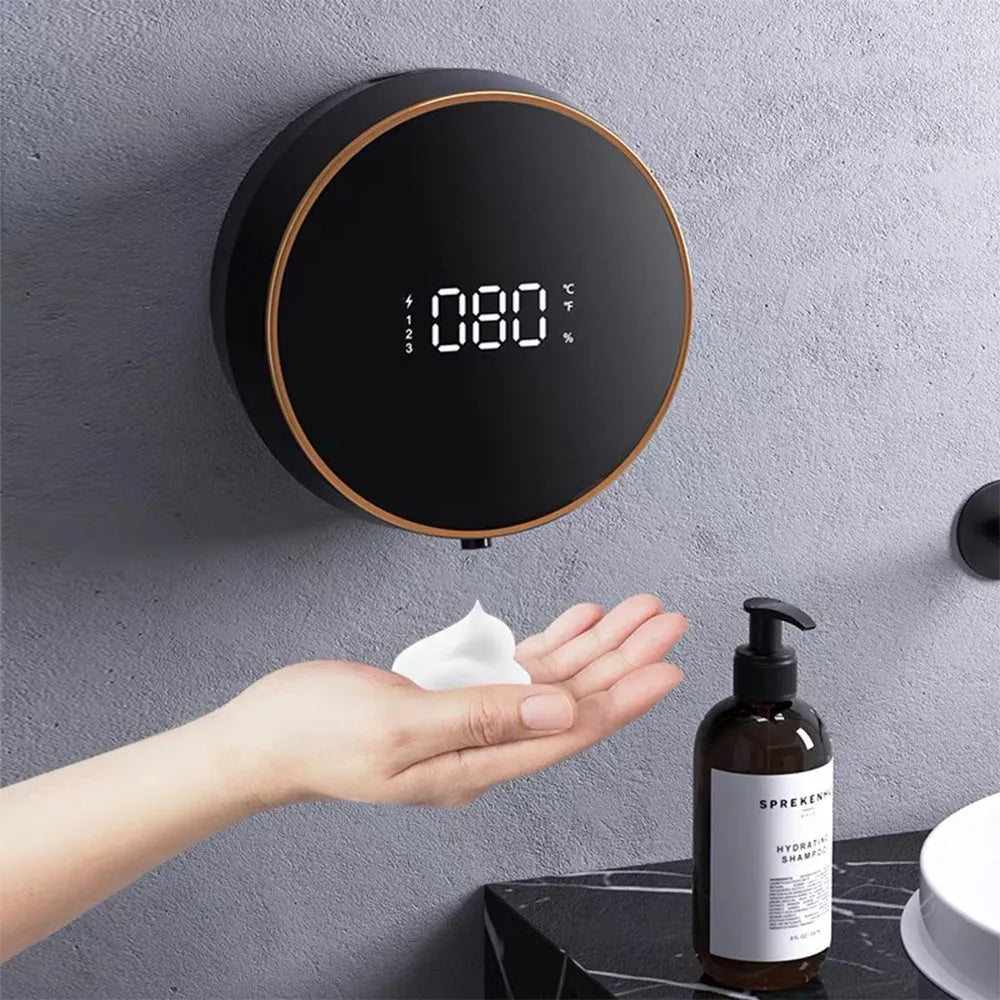 Black automatic sensing foam dispenser with USB port mounted on bathroom wall