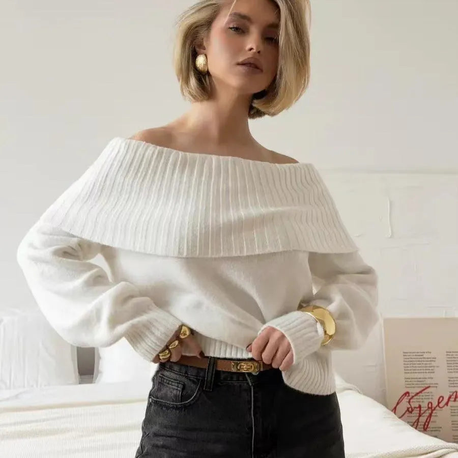 Grey off-the-shoulder women's sweater with a textured 3D rib knit pattern.