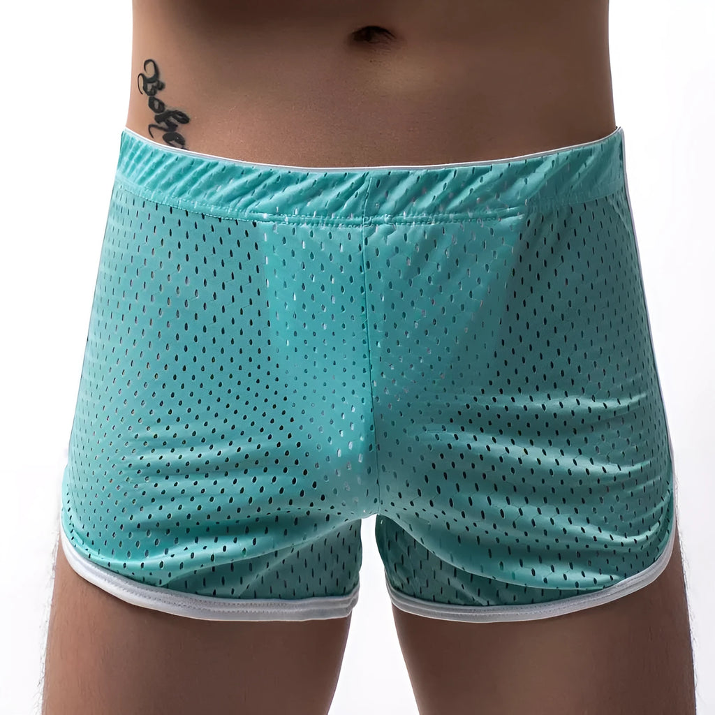 Men's three-point boxers in a cotton and nylon blend, shown in black, on a mid-waist fit model.
