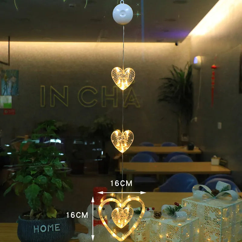 Christmas window lights with star-shaped LED pendants and suction cups for battery-operated festive decoration