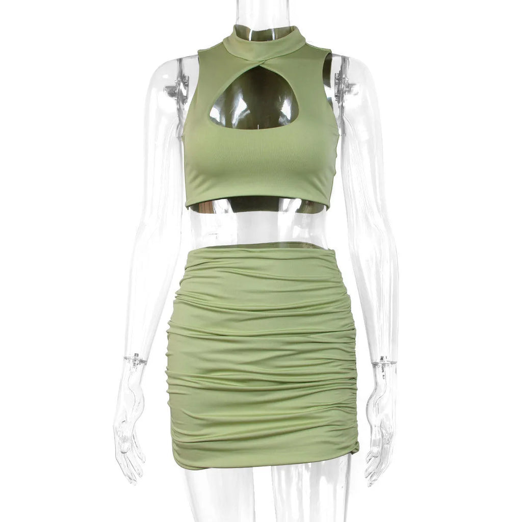 Women's light purple two-piece set with hollow vest top and high-waist split skirt