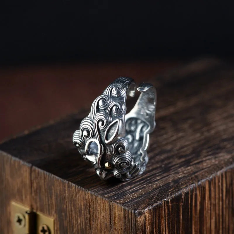 Silver open ring with Jibeast pattern detailing and retro styling