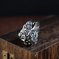 Silver open ring with Jibeast pattern detailing and retro styling