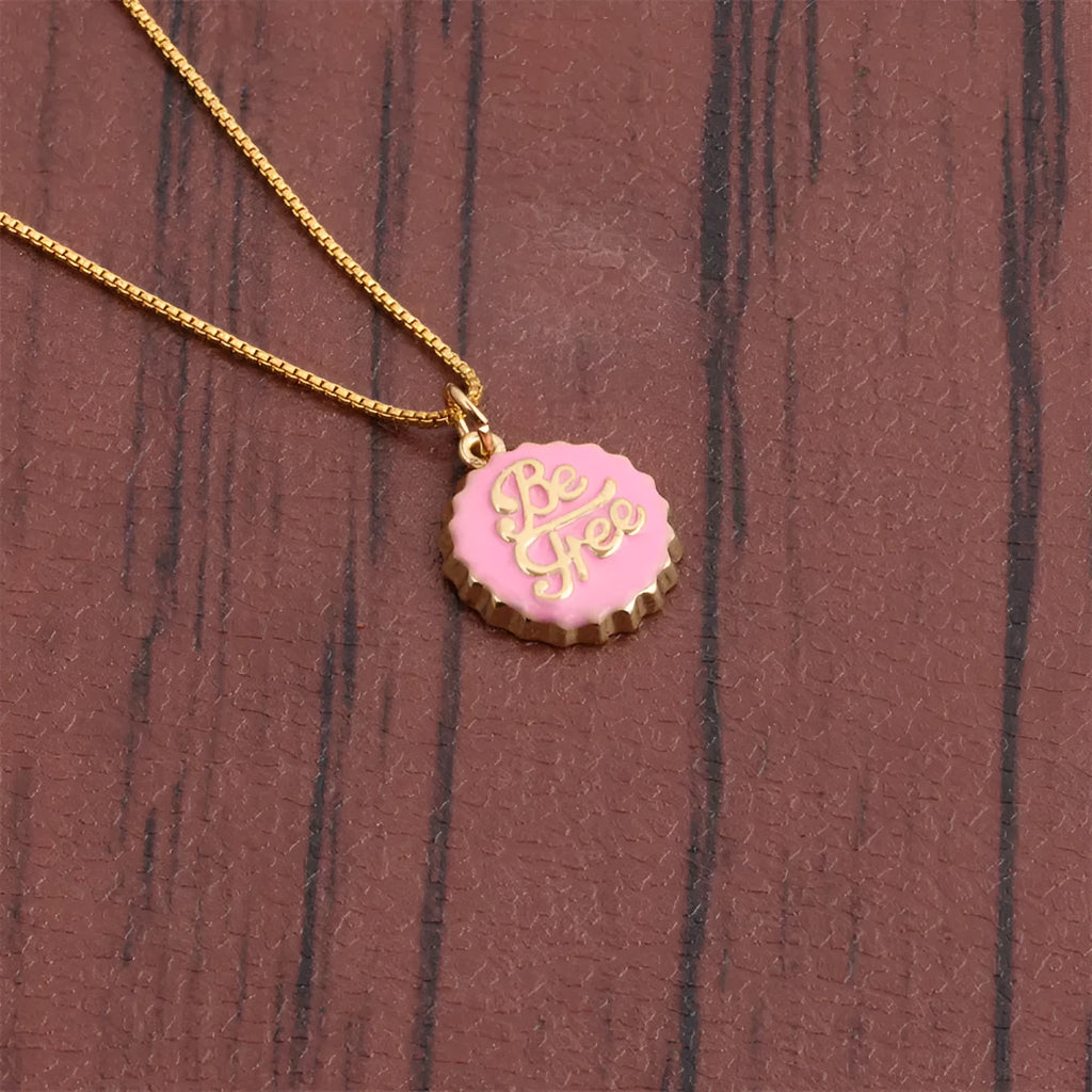 Gold plated bottle cap pendant on a copper chain necklace in multiple colour options.