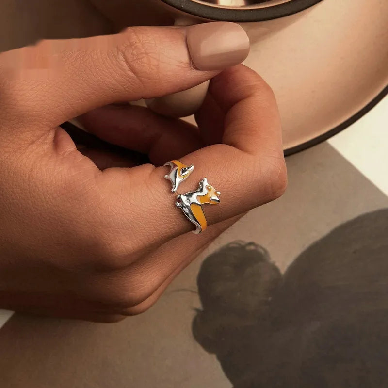 Silver ring with a raised cartoon corgi dog design, colour SCR1014-E.