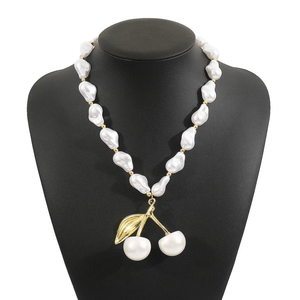 Women's creative necklace with gold alloy cherry fruit pendant on a white imitation pearl chain.