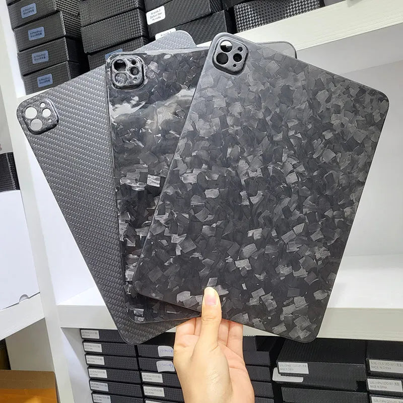 Carbon fibre hard protective case for iPad Pro 11 showing forged surface texture