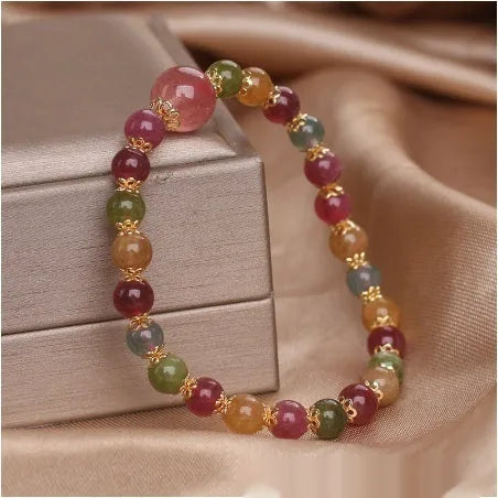 Handmade tourmaline strawberry quartz bracelet with 10mm round lucky beads for gifting occasions