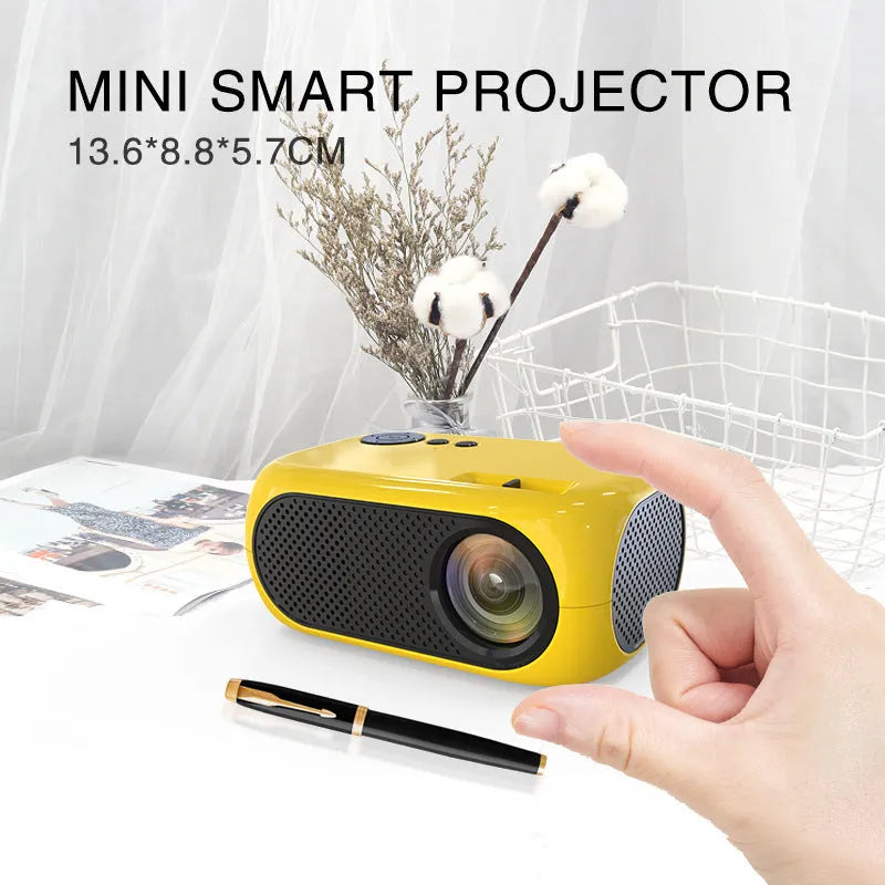 M24 micro mini portable LED projector in gold or white with power adapter and AV cable