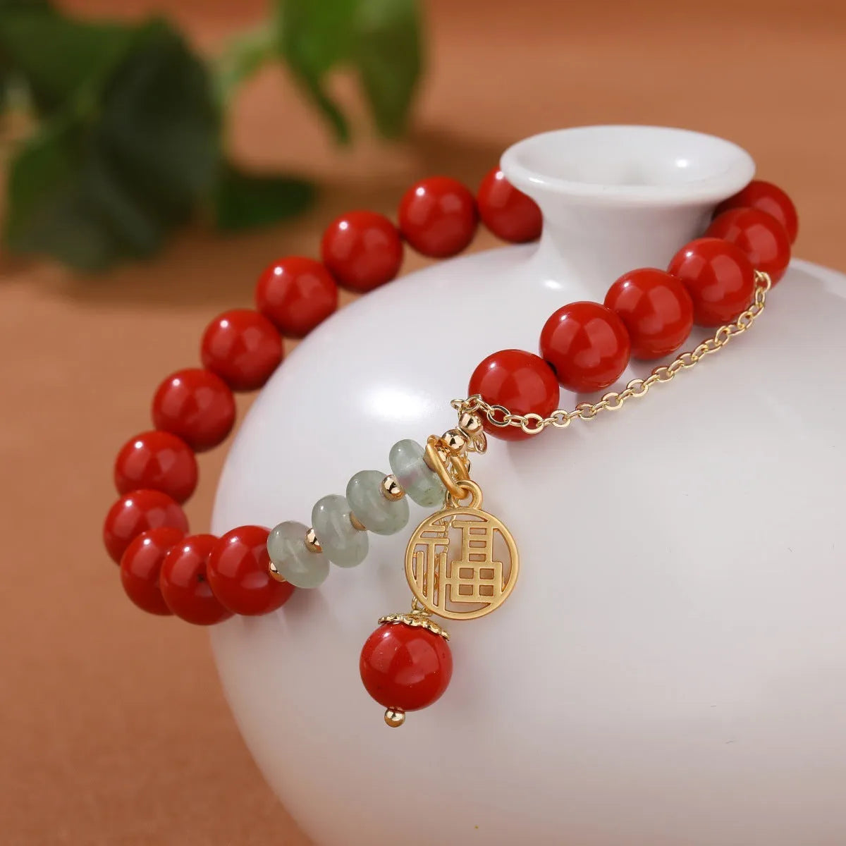 Retro women's red sand cinnabar bracelet with carved fu character and jade spacer