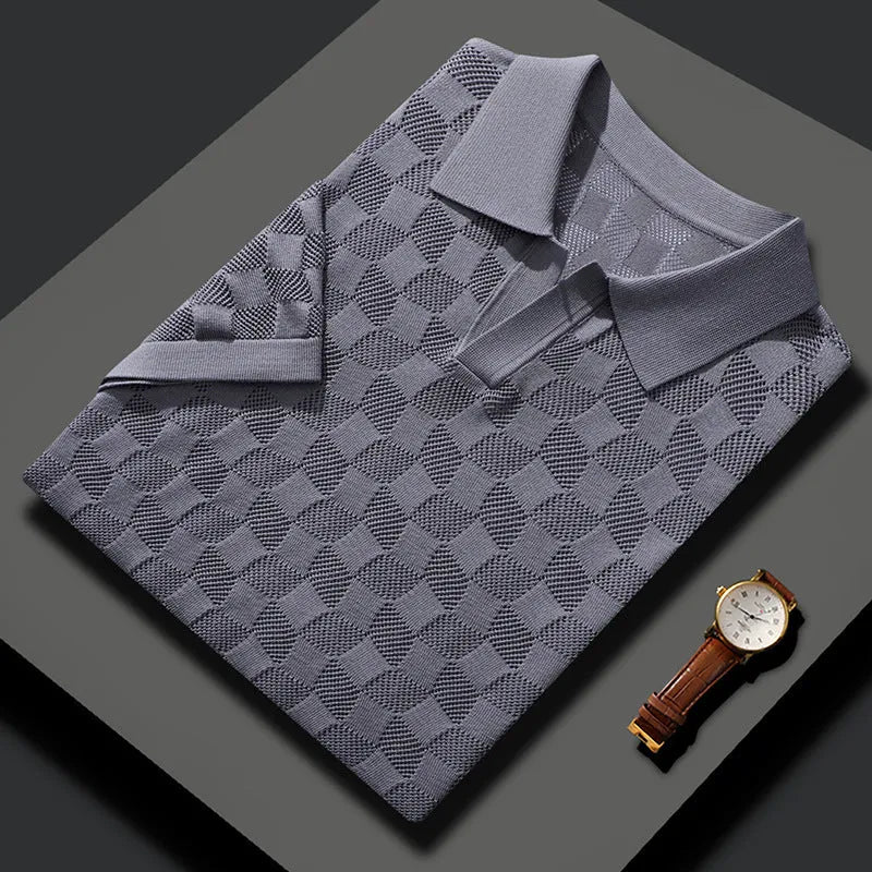 Man wearing a camel-coloured short sleeve sweater with a lapel collar, made from mulberry silk jacquard fabric.