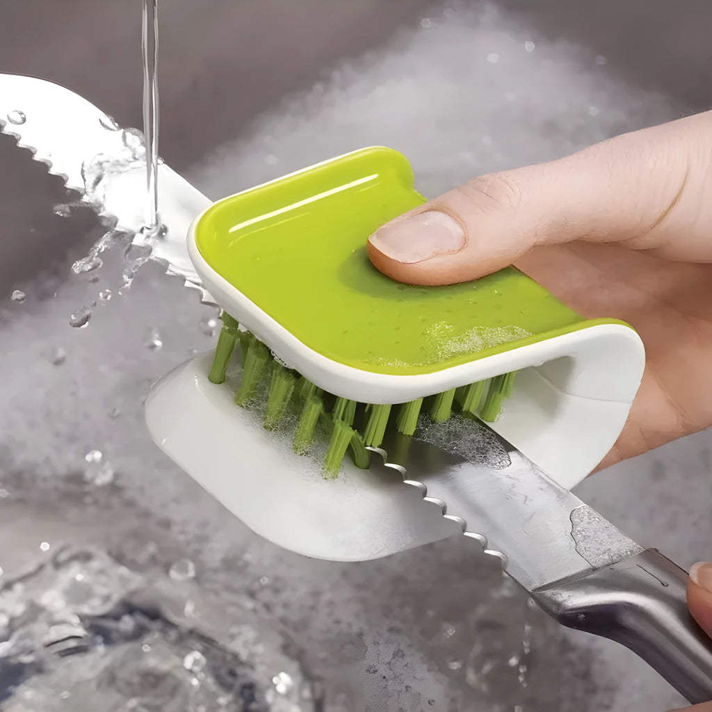 Blue U-shaped plastic brush with bristles for cleaning knives and cutlery in a kitchen.
