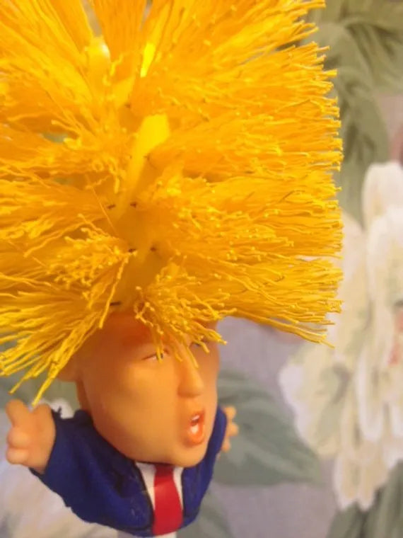 Yellow plastic Donald Trump toilet brush with 40cm length and hanging slot