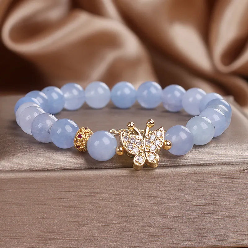 Sky blue aquamarine butterfly crystal bracelet with pearls and rhinestones measuring 17cm length