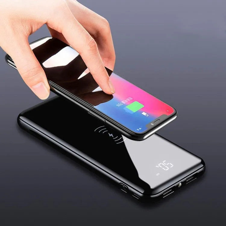 Multifunctional mirror wireless charger with lithium battery in mirror finish on desktop