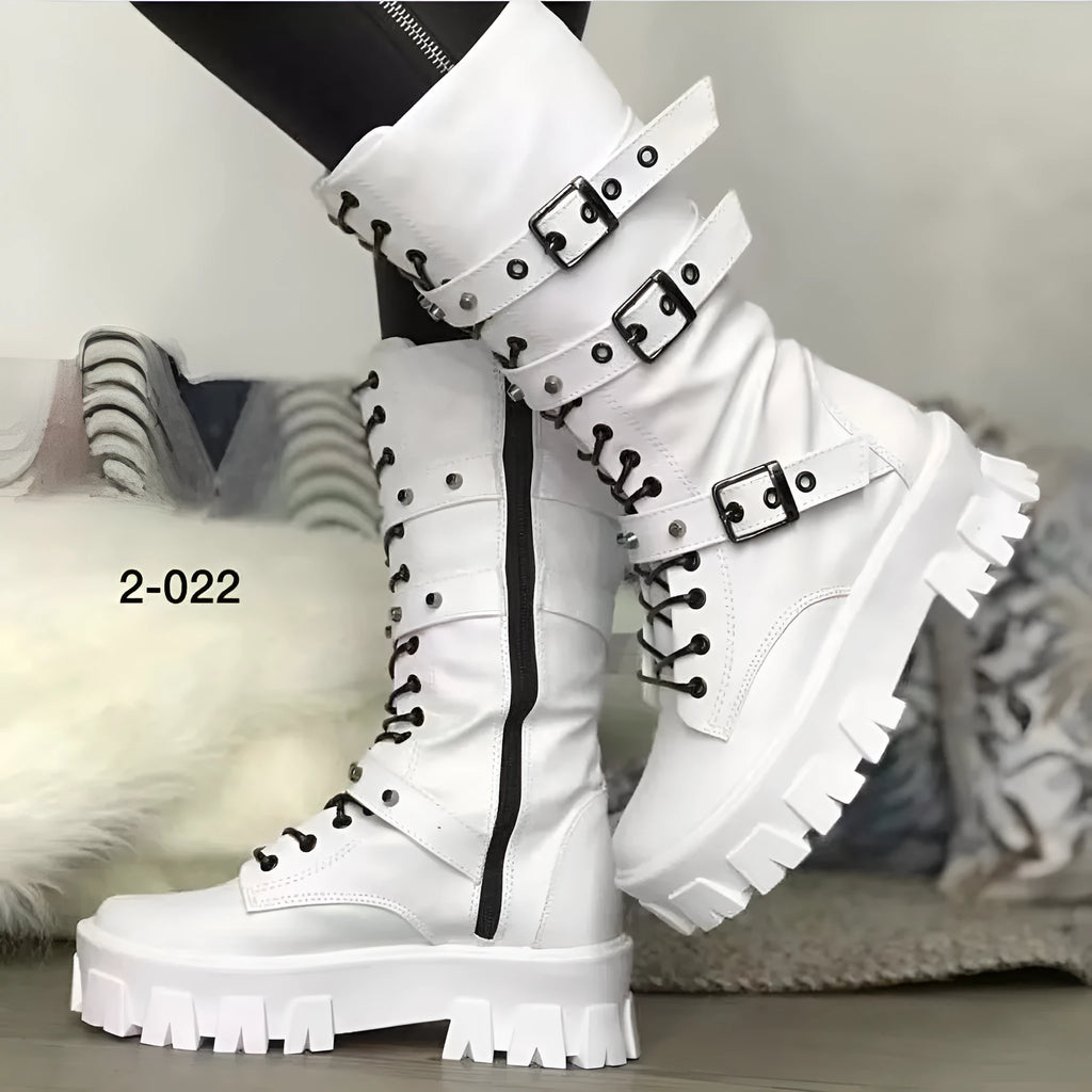 Women's black mid-calf knight boots with a large metal buckle and side zip.