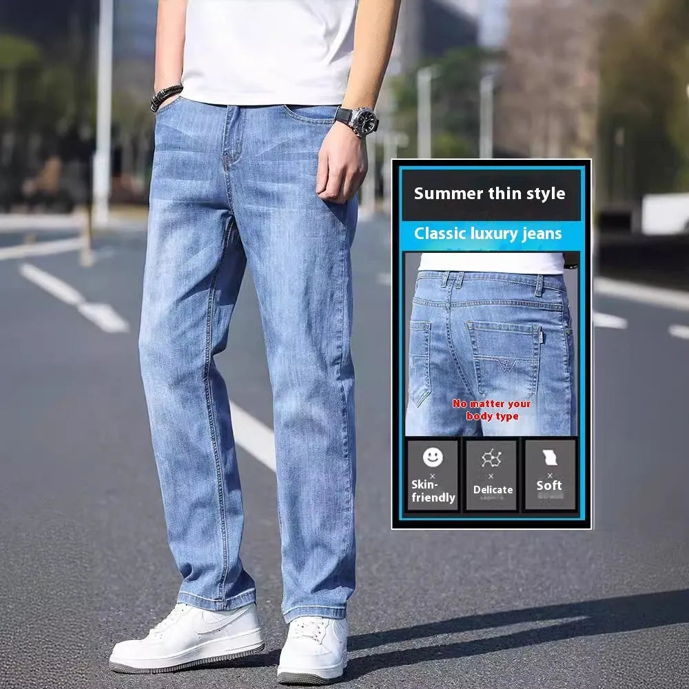 Men's thin stretch tapered denim trousers in light blue colour on a business casual model
