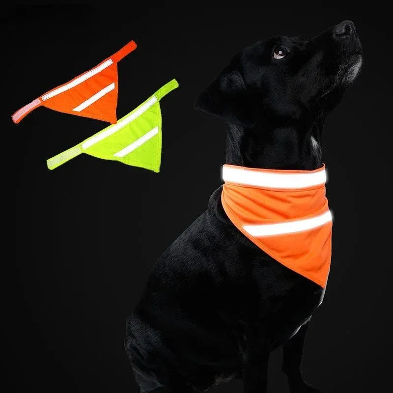 Bright orange polyester dog bandana with adhesive strap shown on canine neck