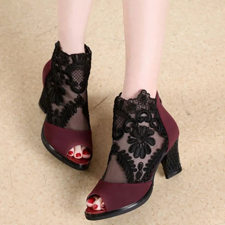 Black floral lace gladiator sandals with square high heel and peep toe design