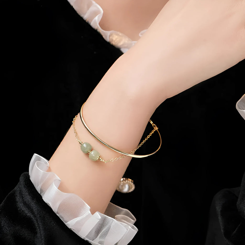 Hetian jade lucky beads bracelet with gold inlay treatment in women's fake two pieces style